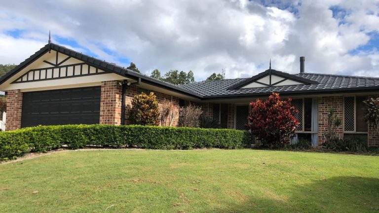 Brick House With Garage — Roofers In Gold Coast, QLD