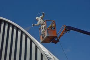 Roof Painting of A Commercial Building in Progress